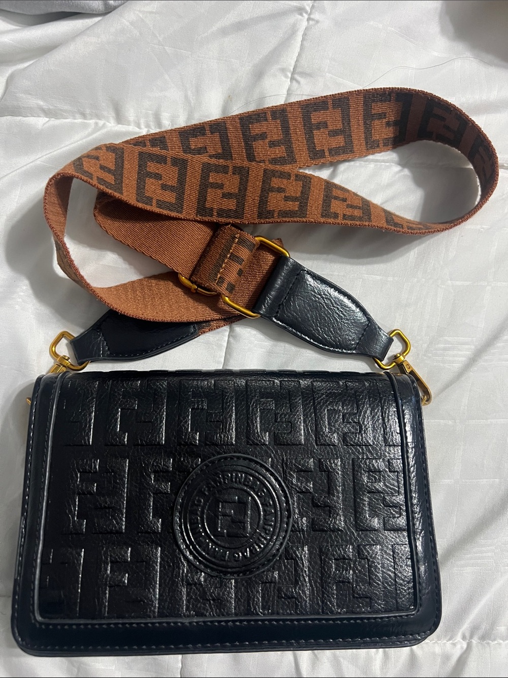 Black Embossed Leather Crossbody Bag with Brown Logo Strap